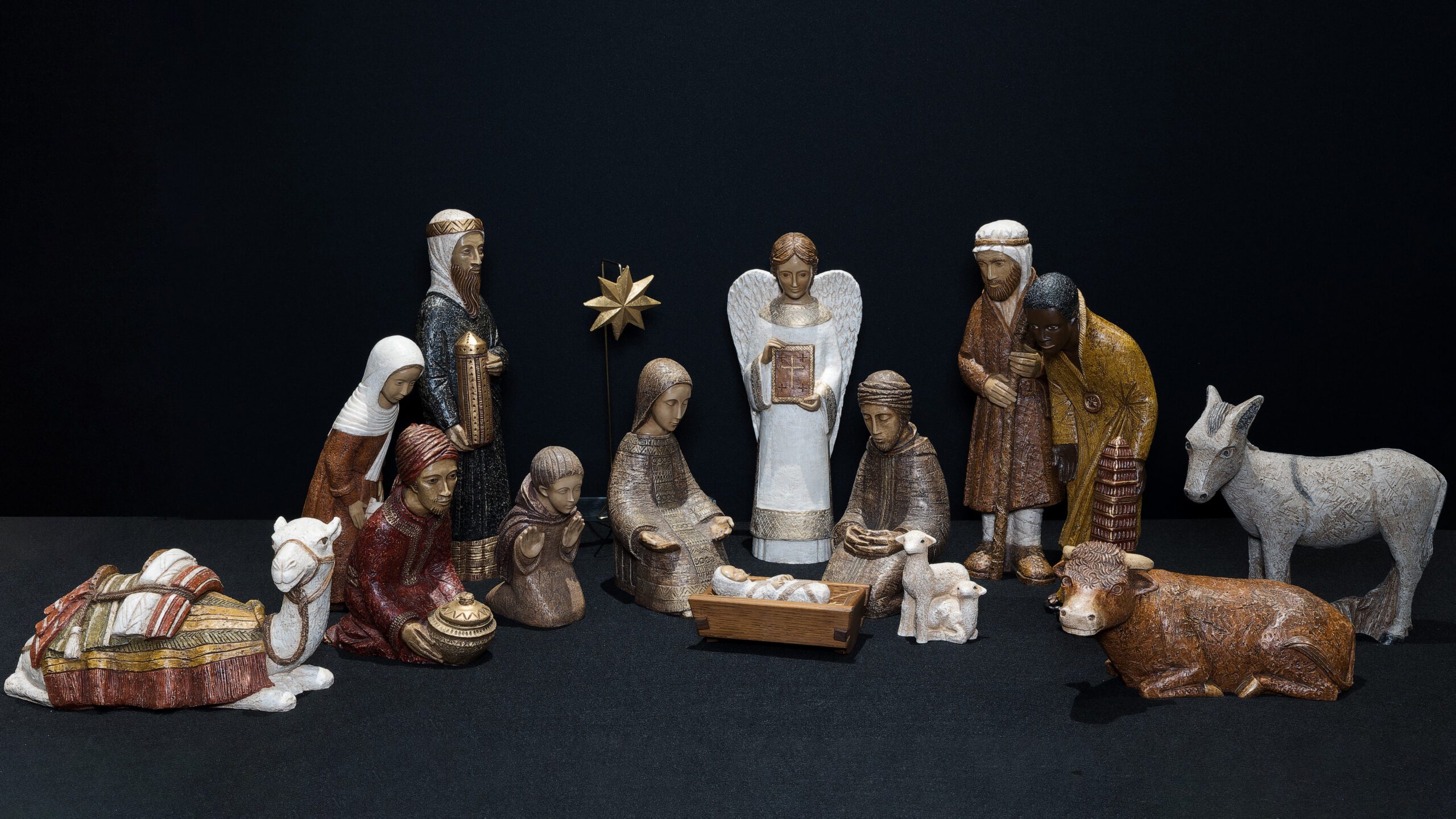This peasant crèche with animals from Mougères, France, is created from dolomite stone, resin and polychrome. PHOTO BY AARON JOSEPH