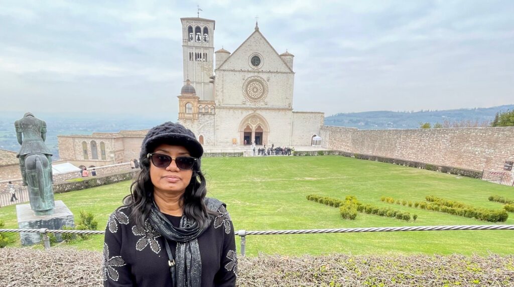Archdiocesan Employee Venerates Mortal Remains of St. Francis of Assisi
